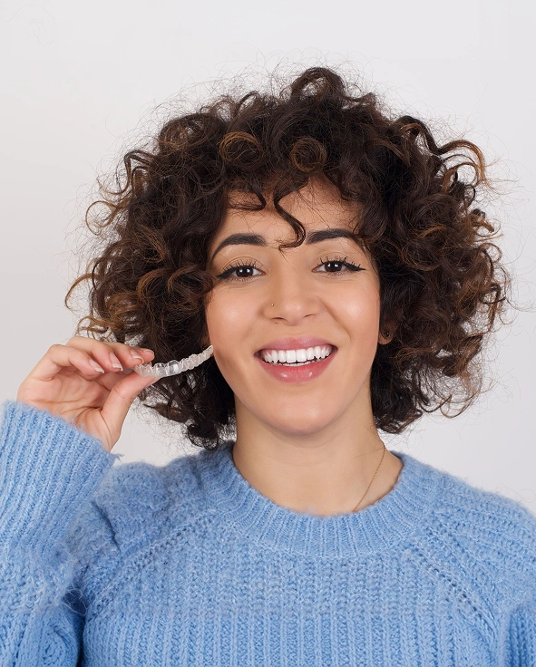 Happy orthodontic patient with a confident smile